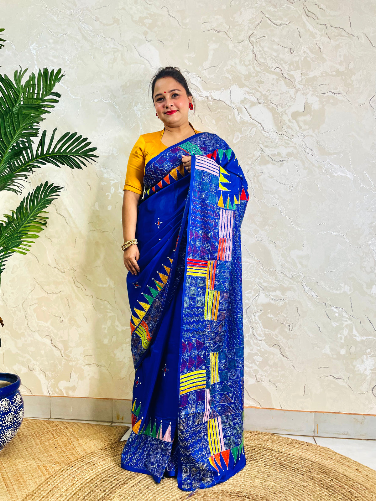 Royal blue Kantha stitch saree with geometric pattern, front standing view