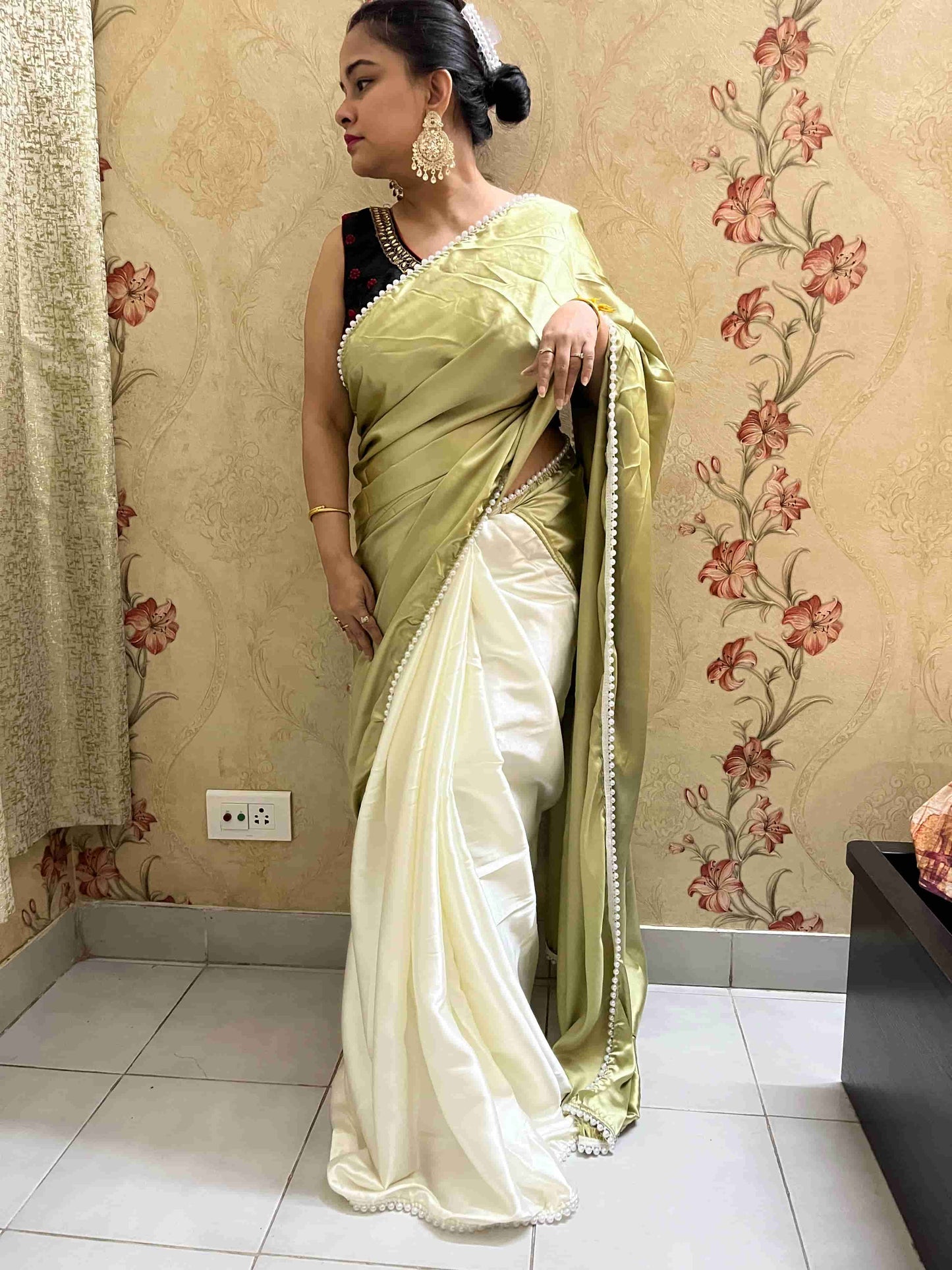 Detail of Handwoven Design on Sage Green Satin Silk Saree