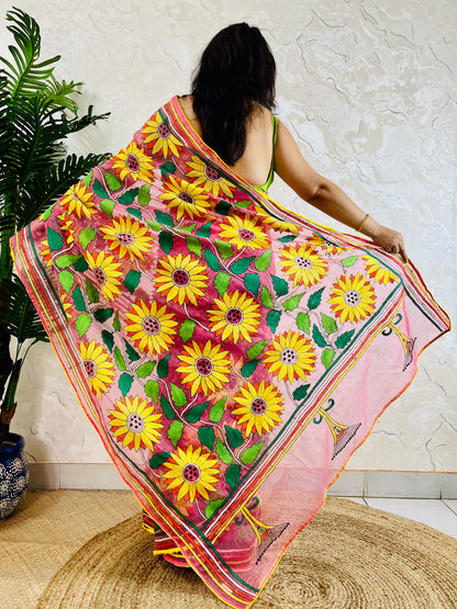 Baby pink organza saree with hand-stitched Sunflower Kantha embroidery, pallu spread showing floral detailing – Desi Aadat