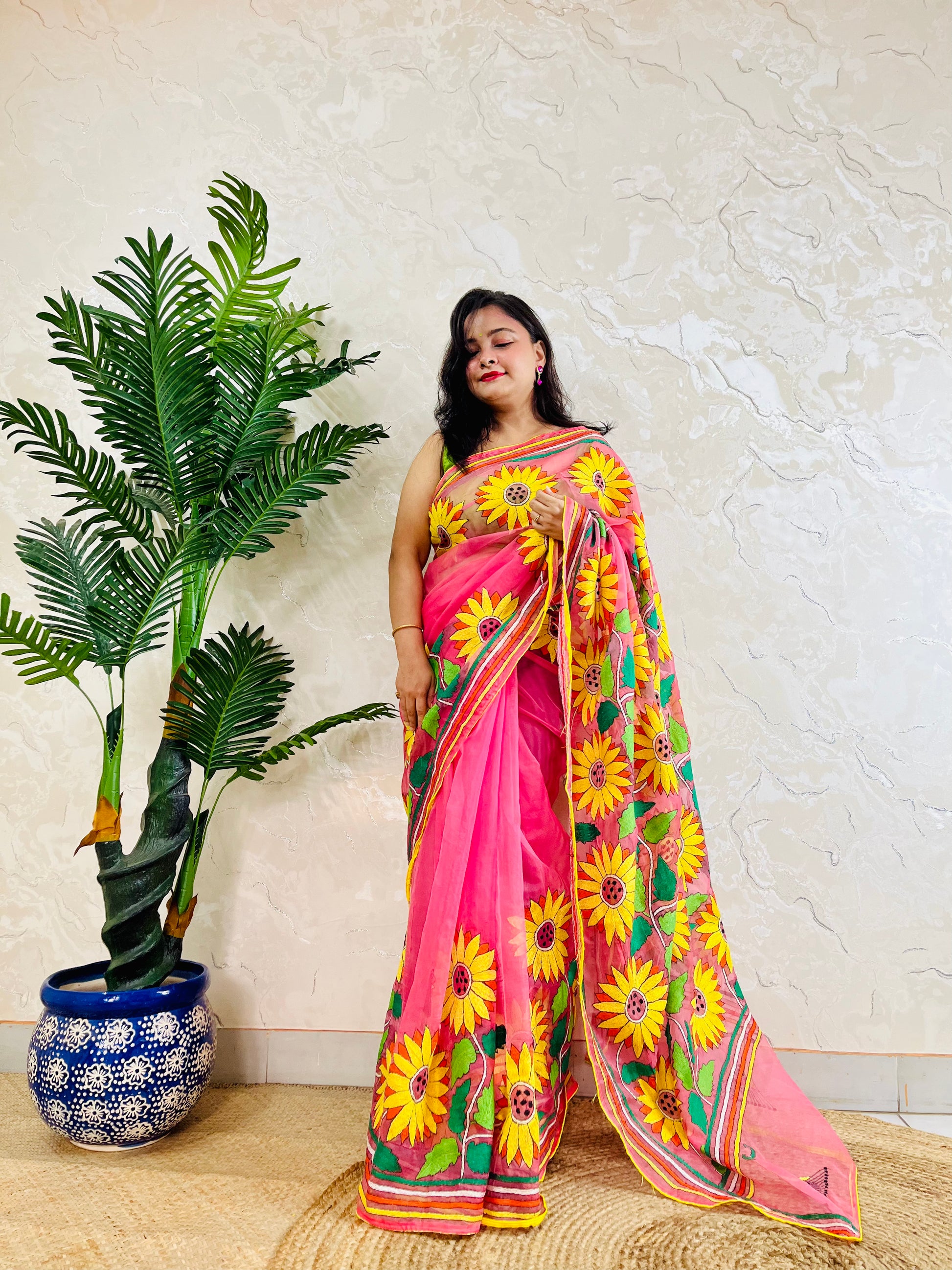 Baby pink handwoven organza saree with Sunflower Kantha stitch embroidery, front drape view – Desi Aadat