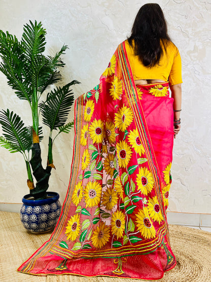 Crimson red Kantha stitch sunflower saree, back pallu standing view