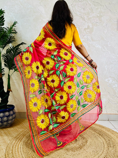 Crimson red Kantha stitch sunflower saree, back pallu standing view