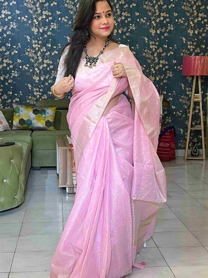 Elegant woman in Baby Pink tissue saree showcasing Desi Aadat’s handwoven design