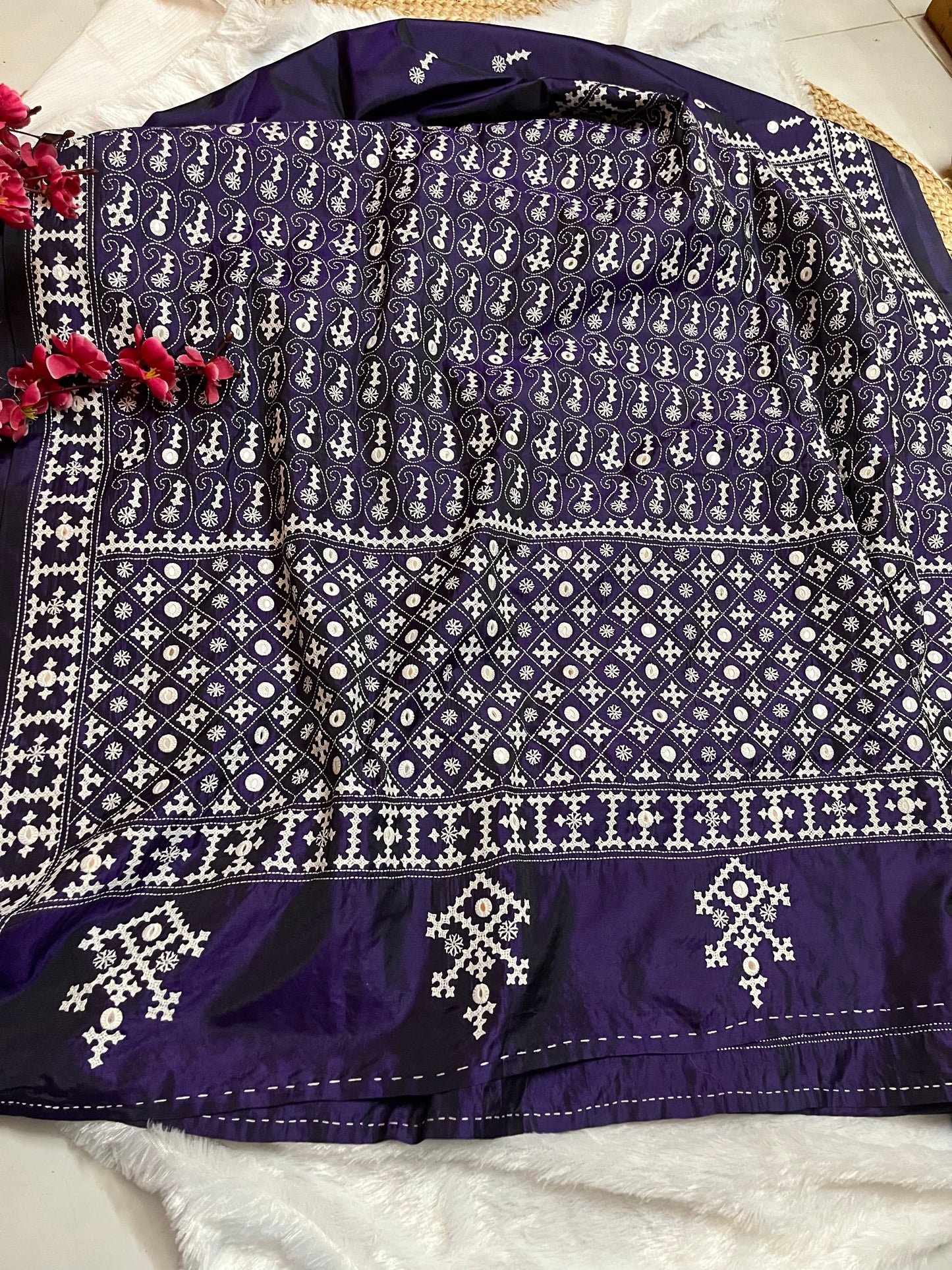 Detailed texture of Blended Bangalore silk with raised embroidery and hand-set mirror work