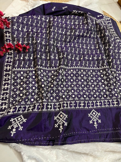 Detailed texture of Blended Bangalore silk with raised embroidery and hand-set mirror work