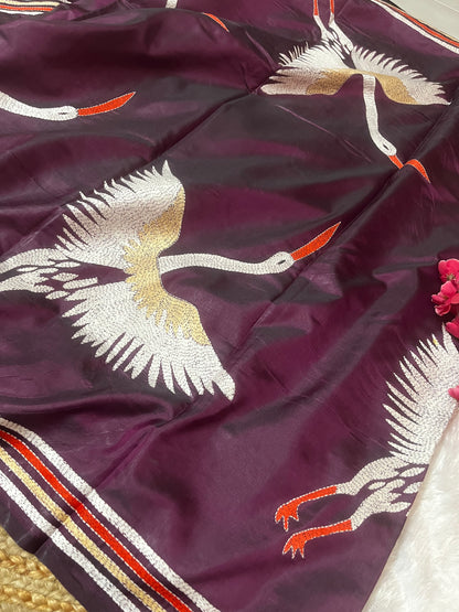 Traditional saree look featuring wine kantha stitch saree with ethnic accessories