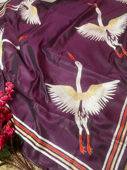 Traditional saree look featuring wine kantha stitch saree with ethnic accessories