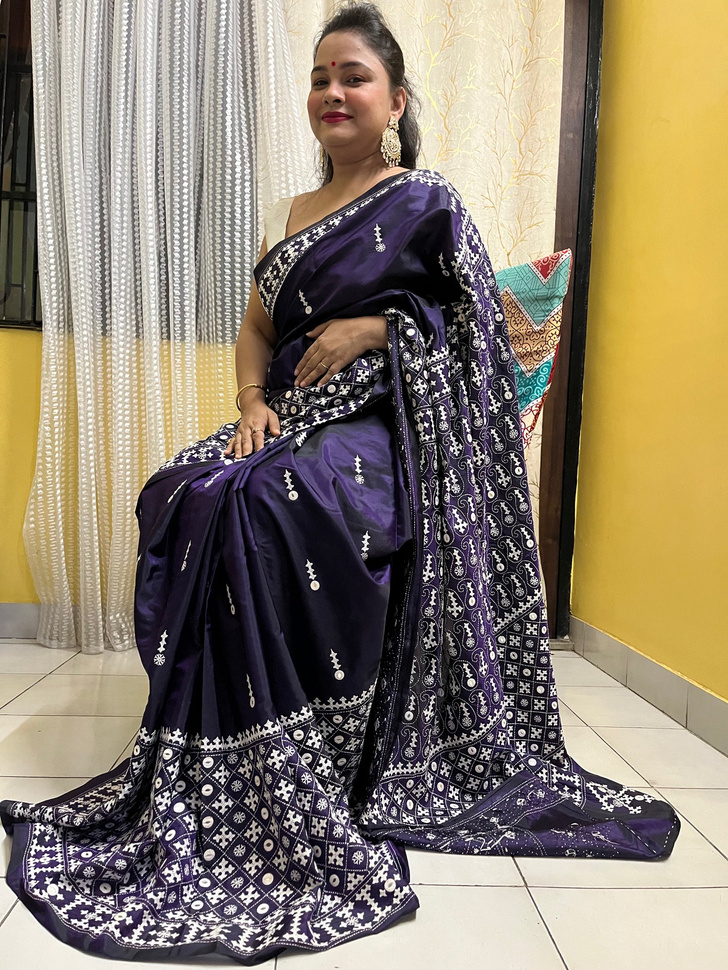 Model wearing a Violet Gujarati Stitch Saree with authentic Kutch hand embroidery and mirror work by Desi Aadat artisans
