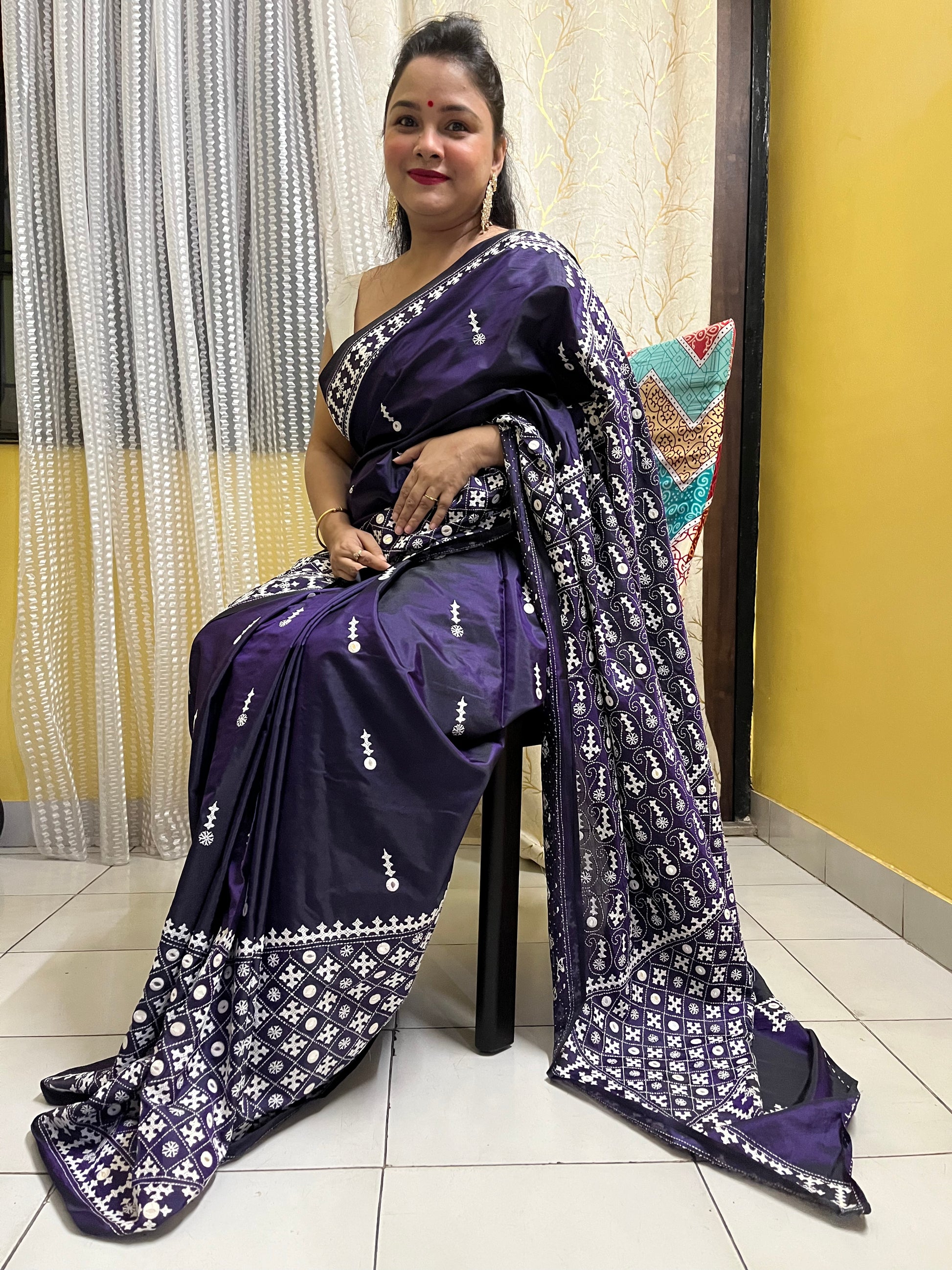 Model wearing a Violet Gujarati Stitch Saree with authentic Kutch hand embroidery and mirror work by Desi Aadat artisans