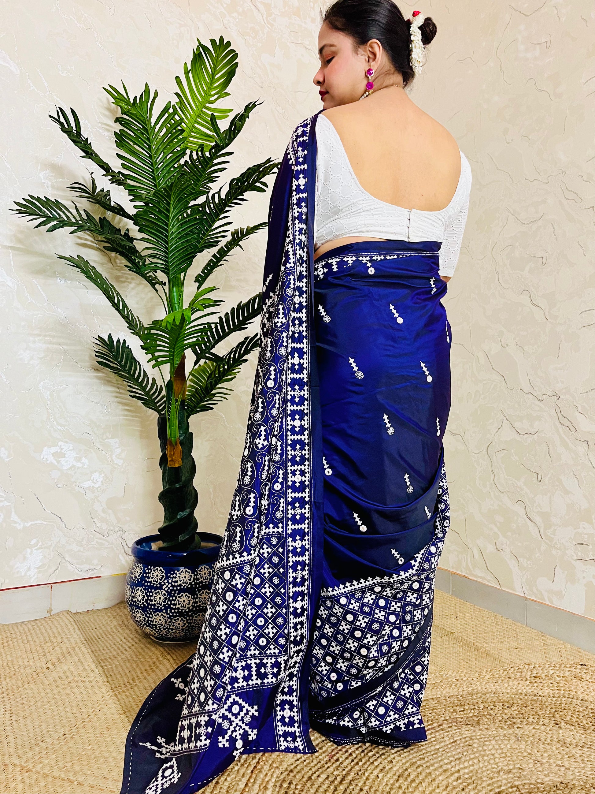 Model wearing a Violet Gujarati Stitch Saree with authentic Kutch hand embroidery and mirror work by Desi Aadat artisans