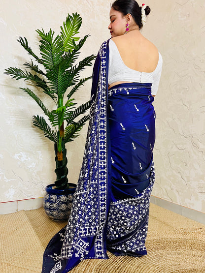 Model wearing a Violet Gujarati Stitch Saree with authentic Kutch hand embroidery and mirror work by Desi Aadat artisans