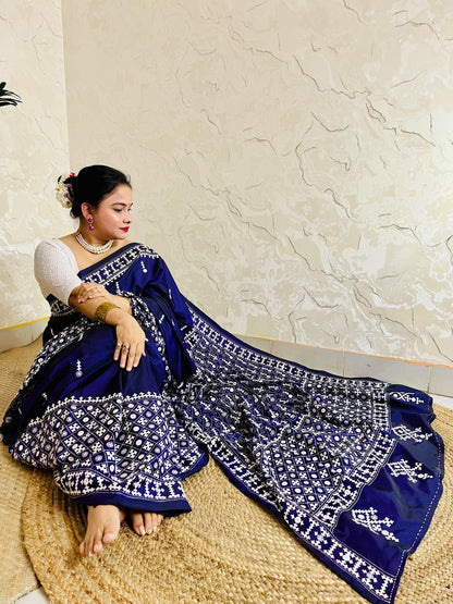 Model wearing a Violet Gujarati Stitch Saree with authentic Kutch hand embroidery and mirror work by Desi Aadat artisans