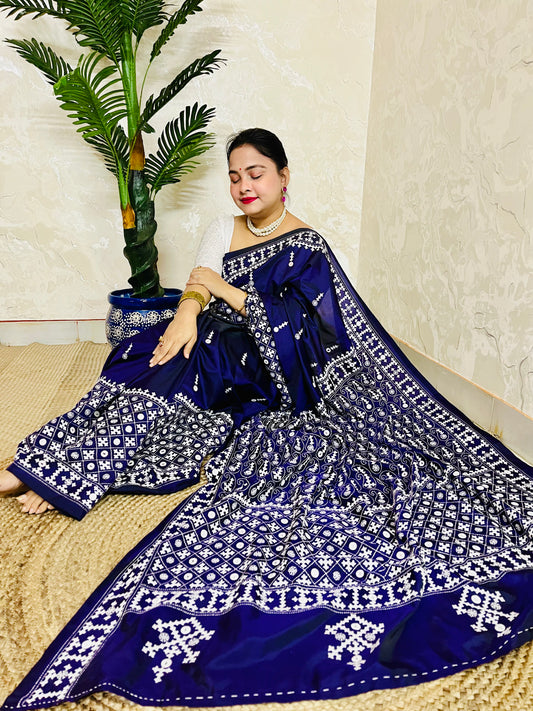 Model wearing a Violet Gujarati Stitch Saree with authentic Kutch hand embroidery and mirror work by Desi Aadat artisans