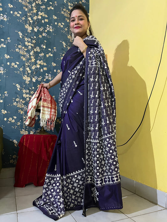 Model wearing a Violet Gujarati Stitch Saree with authentic Kutch hand embroidery and mirror work by Desi Aadat artisans