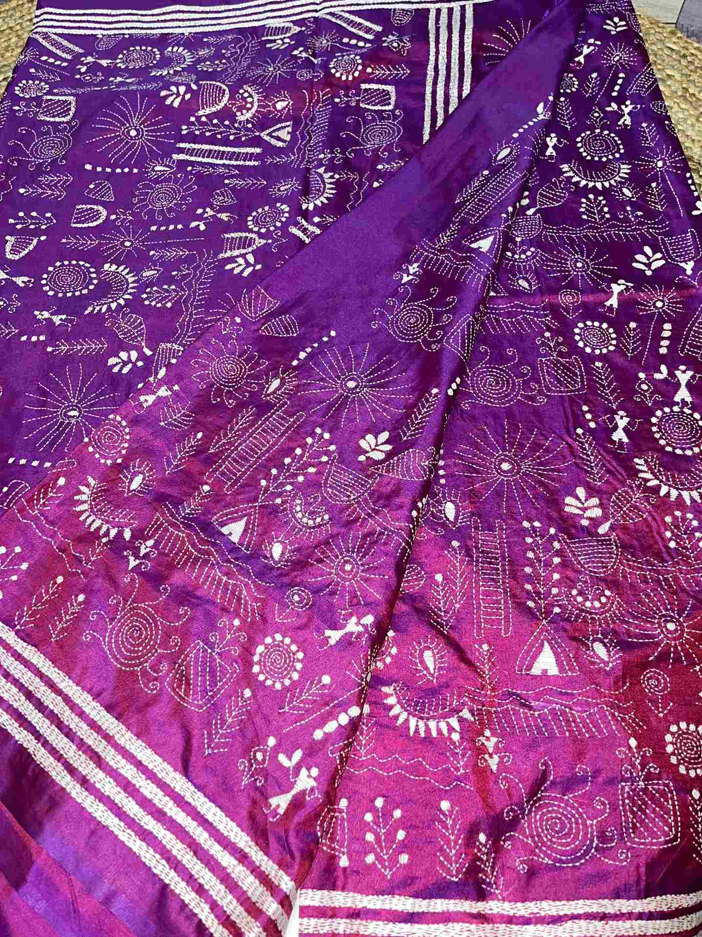 Close-up of Kantha stitch and Worli motifs on Purple silk saree – best ethnic wear for women
