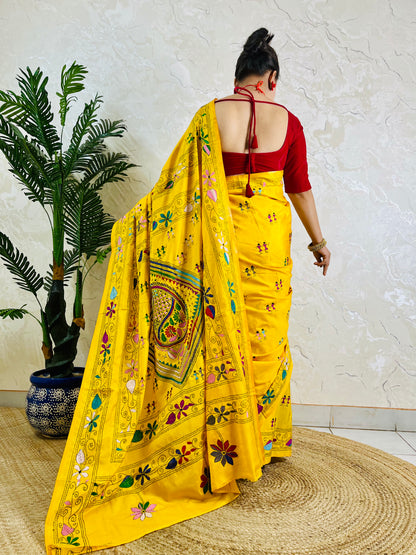 Back view of yellow Kantha saree with dancing figure motifs on Bangalore silk